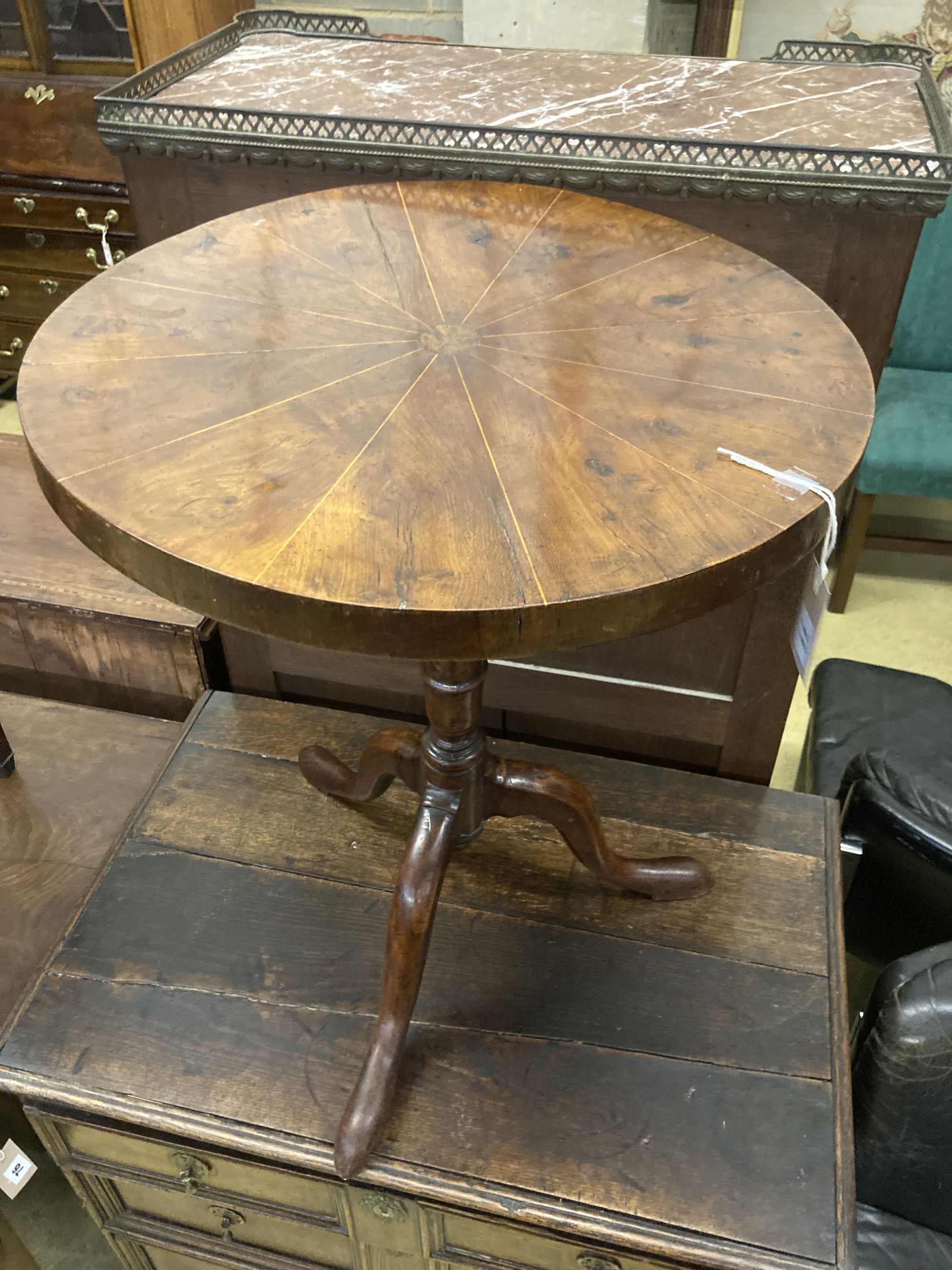 A yew wood circular tripod table, 53cm diameter, height 65cm